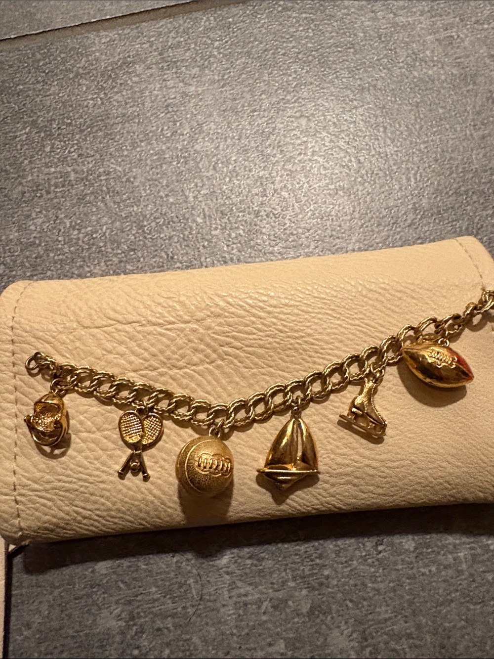 Monet Sports Theme Gold Tone Charm Bracelet Tennis Golf Skating 7 Charms